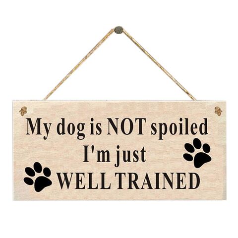 Træskilt med hundecitater